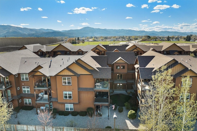 drone / aerial view with a residential view and a mountain view