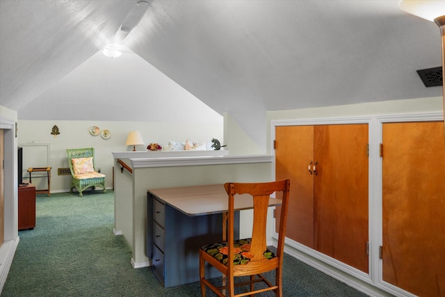 interior space with vaulted ceiling, carpet floors, visible vents, and baseboards