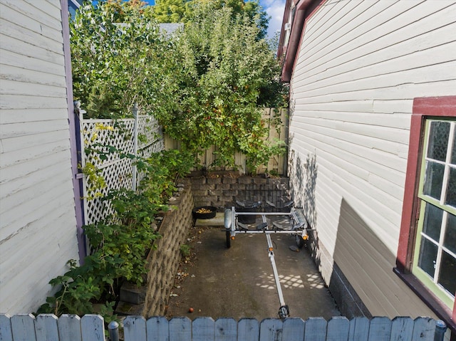 view of side of property with fence