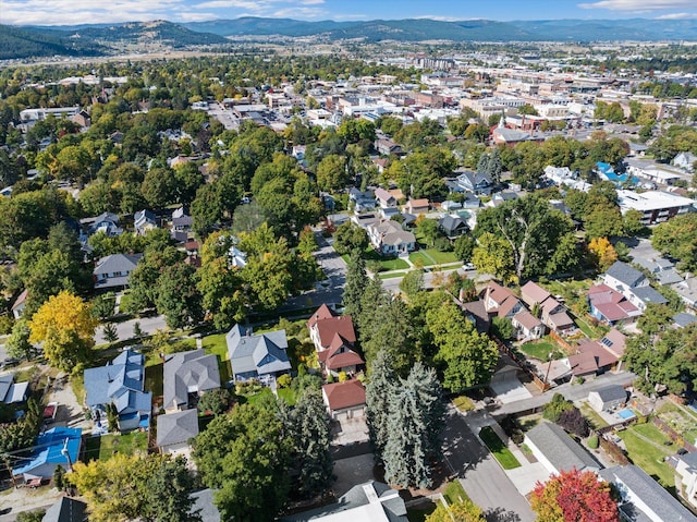 drone / aerial view featuring a mountain view and a residential view