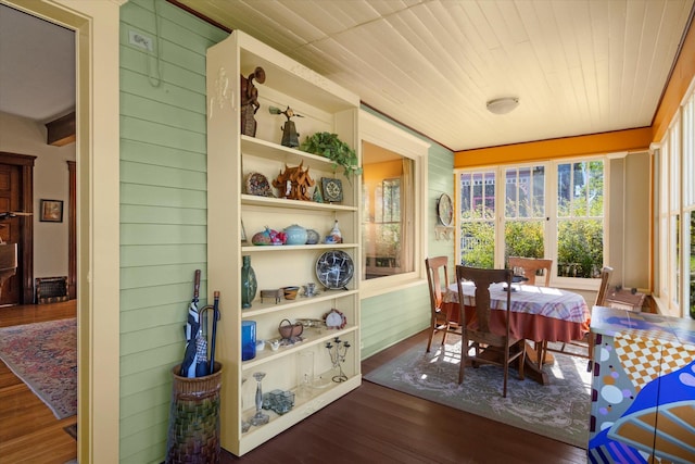 sunroom featuring wood ceiling