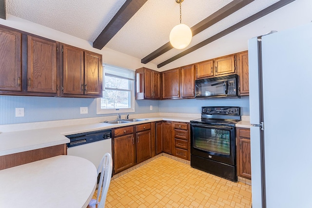 kitchen with lofted ceiling with beams, black appliances, a sink, and light countertops