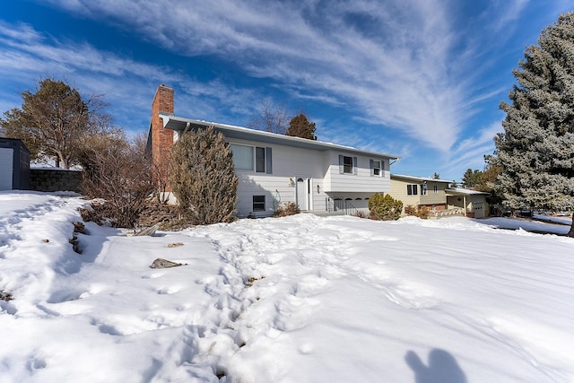 view of front of property with a chimney