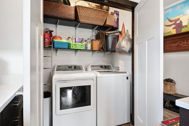 laundry room with laundry area and washer and clothes dryer