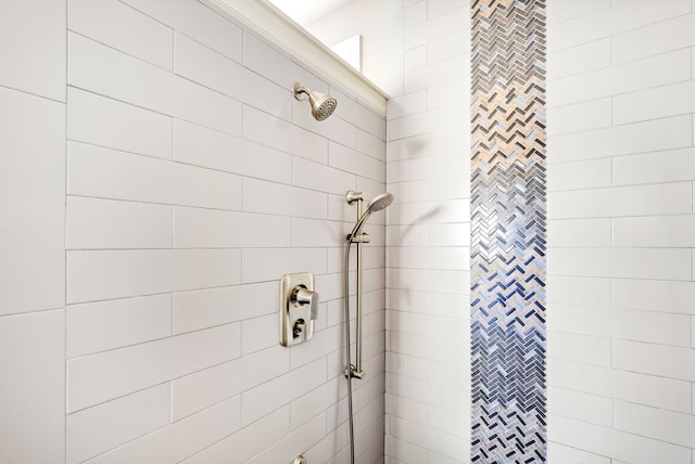 full bathroom with a tile shower