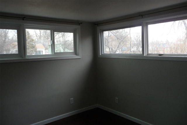 empty room with baseboards