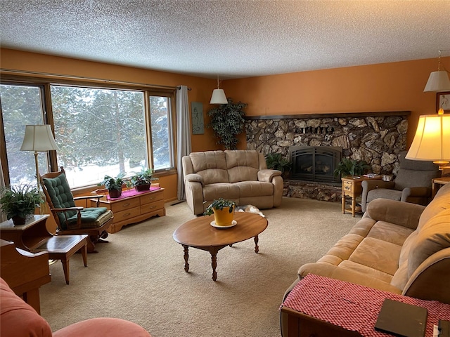 living room featuring a textured ceiling, carpet floors, and a fireplace