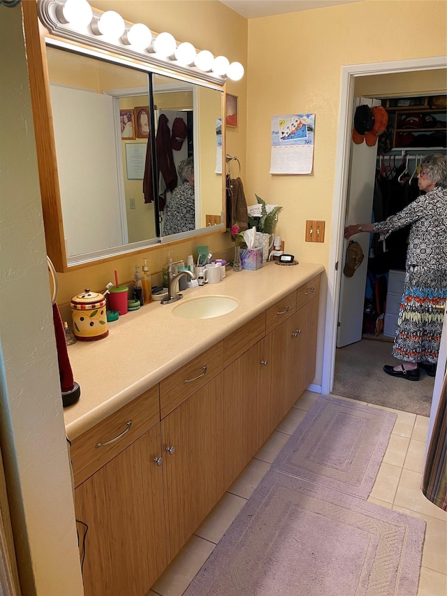 bathroom with vanity and tile patterned floors