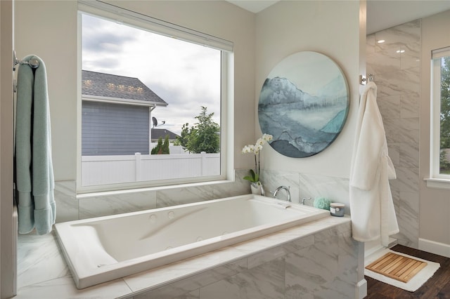 bathroom featuring a jetted tub