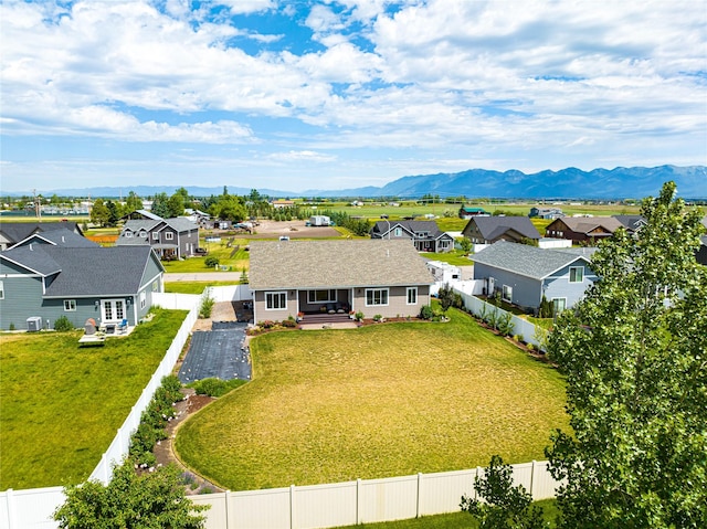 bird's eye view with a residential view and a mountain view