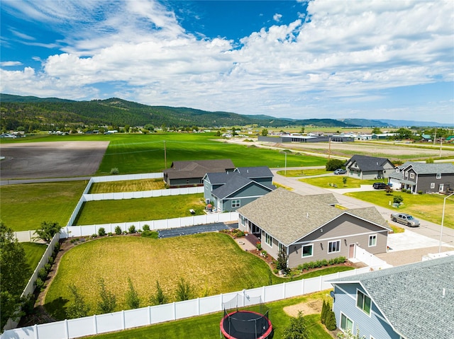 drone / aerial view with a residential view and a mountain view