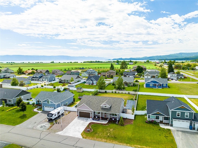 bird's eye view featuring a residential view and a mountain view