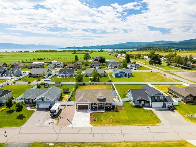 bird's eye view with a residential view and a mountain view