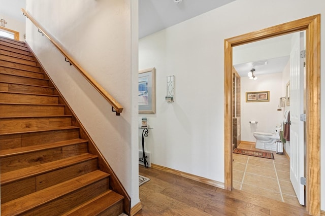 156 Wulff Ln, Lakeside, MT 59922 - stairway with wood finished floors and baseboards