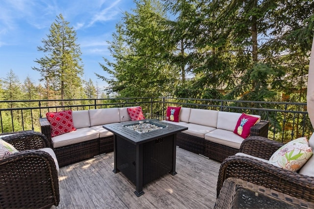 156 Wulff Ln, Lakeside, MT 59922 - wooden terrace with an outdoor living space with a fire pit