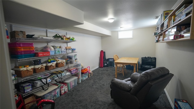 interior space featuring carpet and baseboards