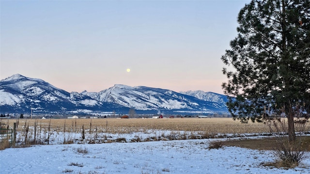 view of mountain feature with a rural view