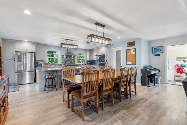 245 Olde Rd, Hamilton, MT 59840 - dining space with light wood-style floors and recessed lighting