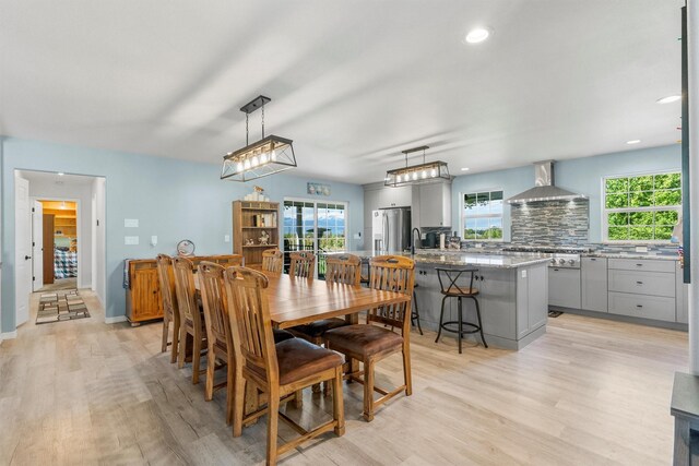 245 Olde Rd, Hamilton, MT 59840 - dining space featuring light wood-style floors, plenty of natural light, baseboards, and recessed lighting