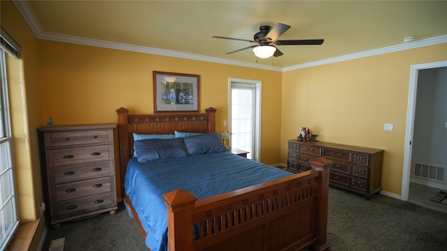 bedroom with carpet, visible vents, and crown molding