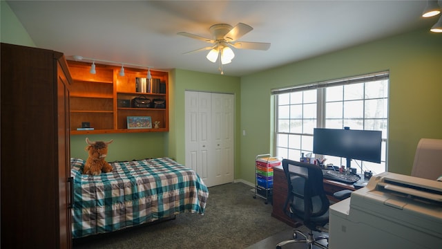 bedroom featuring ceiling fan, carpet floors, and a closet