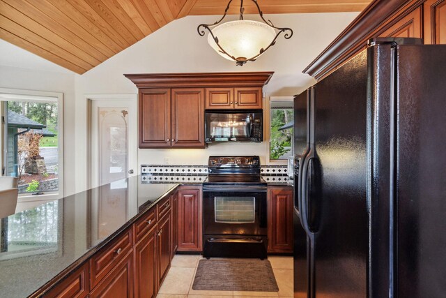 99 Golf Ter, Bigfork, MT 59911 - kitchen featuring black appliances, vaulted ceiling, wooden ceiling, light tile patterned floors, and dark stone counters
