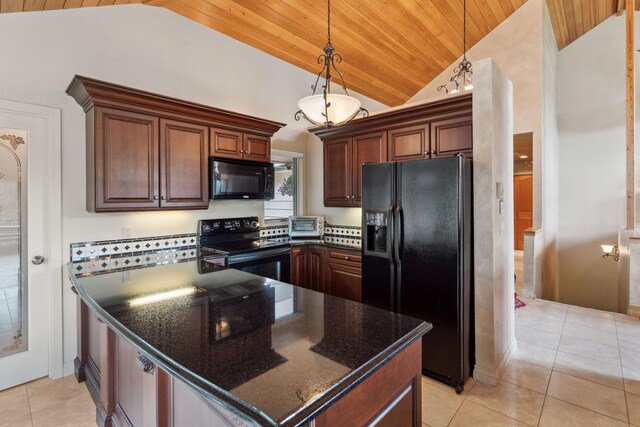99 Golf Ter, Bigfork, MT 59911 - kitchen with black appliances, vaulted ceiling, wooden ceiling, light tile patterned flooring, and dark stone countertops