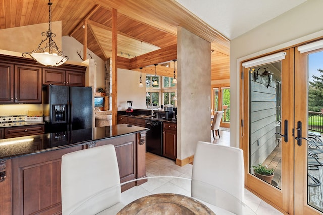 99 Golf Ter, Bigfork, MT 59911 - kitchen with black appliances, french doors, wooden ceiling, a sink, and hanging light fixtures