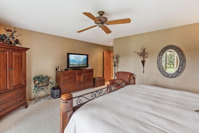 99 Golf Ter, Bigfork, MT 59911 - bedroom with light colored carpet and ceiling fan