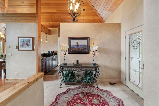 99 Golf Ter, Bigfork, MT 59911 - foyer entrance featuring a chandelier, light tile patterned floors, lofted ceiling, and wooden ceiling