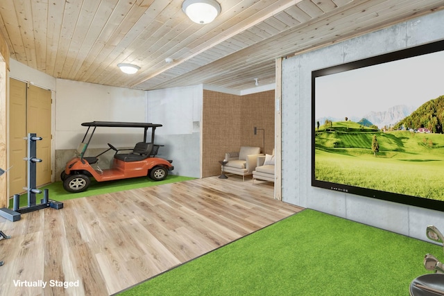 99 Golf Ter, Bigfork, MT 59911 - rec room with a mountain view, wood finished floors, and wooden ceiling