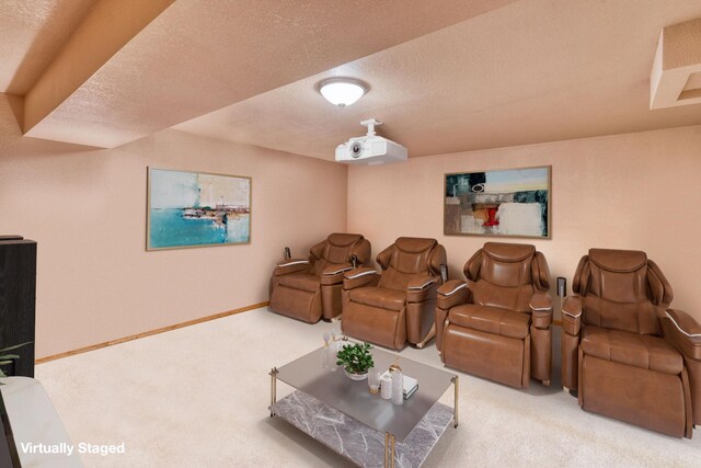 99 Golf Ter, Bigfork, MT 59911 - carpeted cinema room featuring a textured ceiling and baseboards