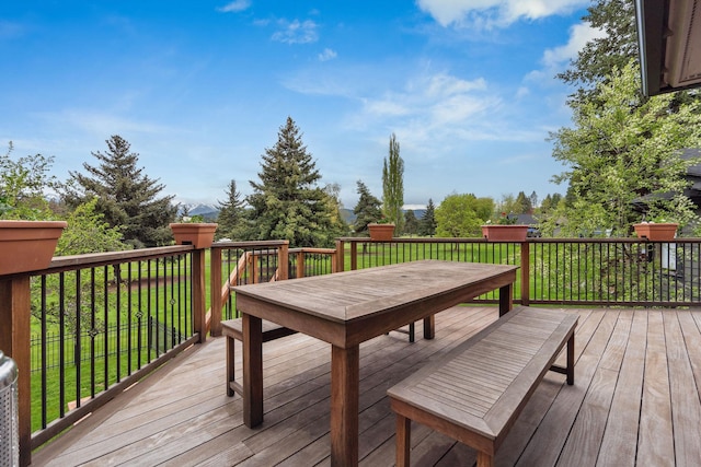 99 Golf Ter, Bigfork, MT 59911 - wooden terrace with outdoor dining space