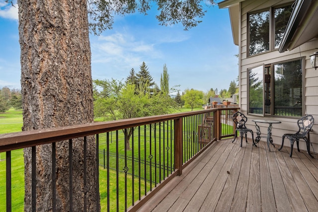 99 Golf Ter, Bigfork, MT 59911 - wooden terrace with a yard