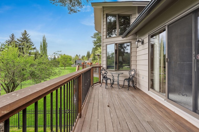 99 Golf Ter, Bigfork, MT 59911 - deck featuring a lawn