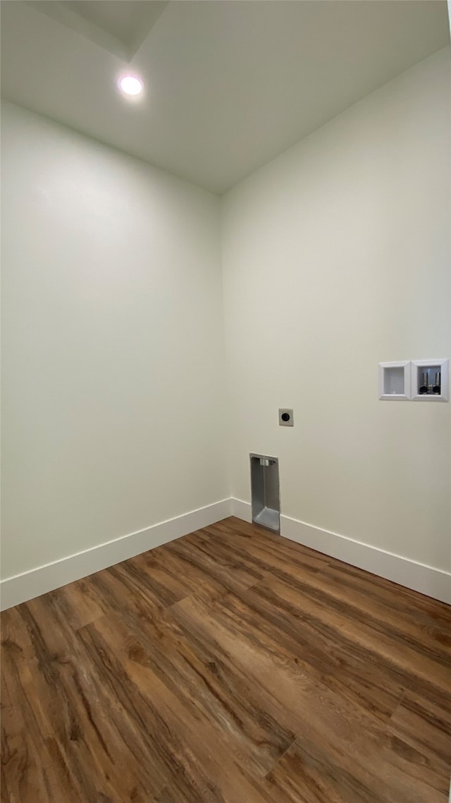 clothes washing area featuring laundry area, washer hookup, baseboards, dark wood-style floors, and electric dryer hookup