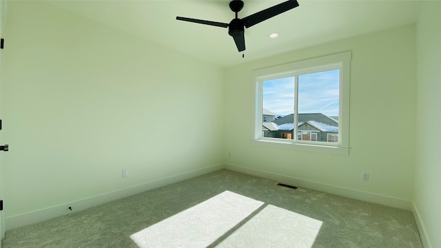 spare room featuring baseboards, visible vents, ceiling fan, carpet floors, and recessed lighting