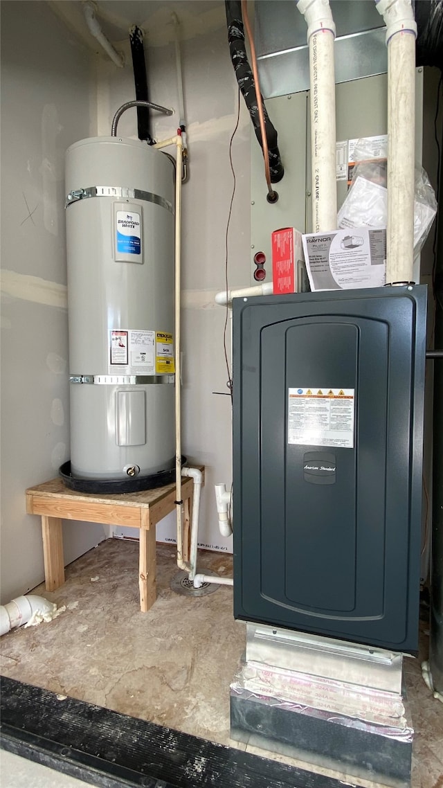 utility room with strapped water heater