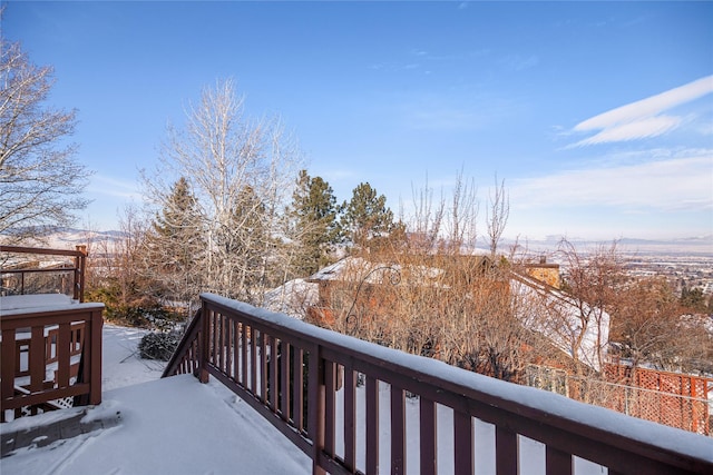 view of snow covered deck