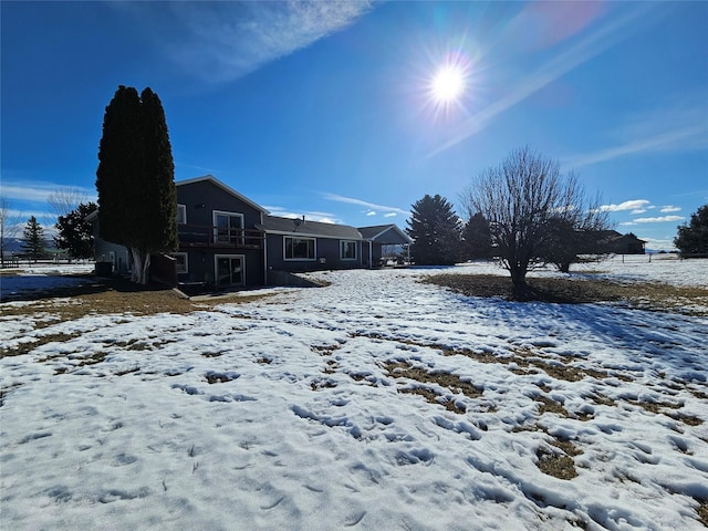 view of yard covered in snow