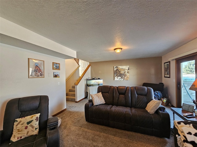 living room featuring stairs, a textured ceiling, carpet, and baseboards