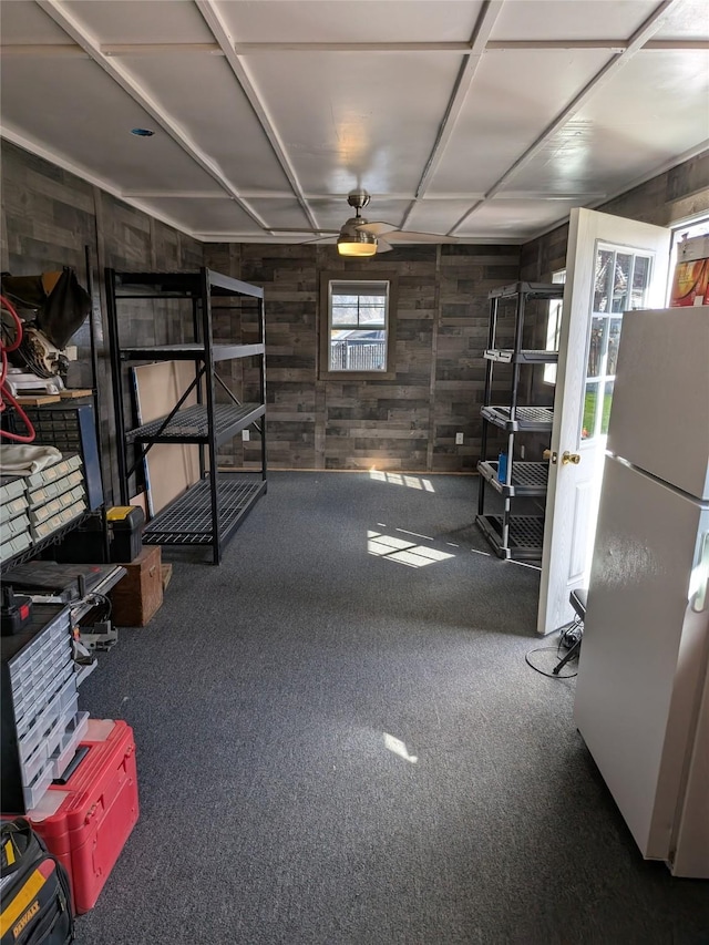 interior space featuring ceiling fan