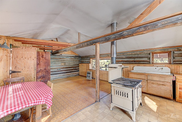 basement with light floors and wooden walls