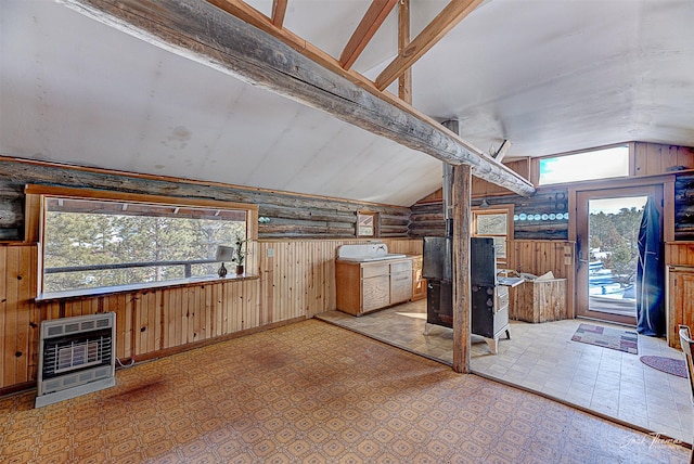 6220 Elkhorn Rd, Helena, MT 59602 - bonus room featuring wooden walls, heating unit, and vaulted ceiling with beams