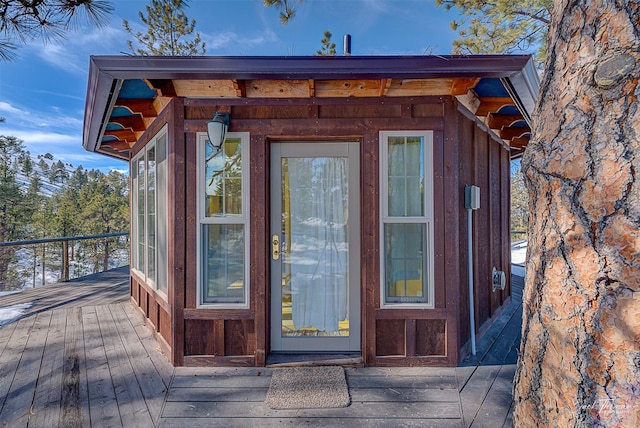 6220 Elkhorn Rd, Helena, MT 59602 - doorway to property with a wooden deck