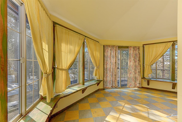 6220 Elkhorn Rd, Helena, MT 59602 - unfurnished sunroom featuring baseboards