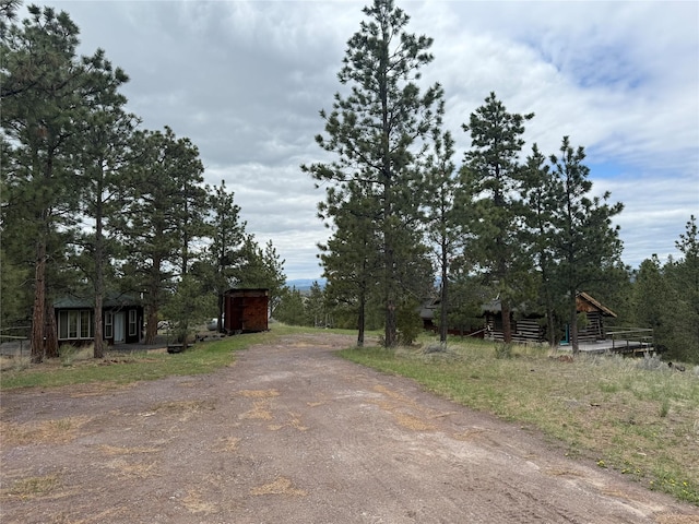 6220 Elkhorn Rd, Helena, MT 59602 - view of road with aphalt driveway