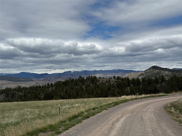 6220 Elkhorn Rd, Helena, MT 59602 - mountain view featuring a wooded view and a rural view