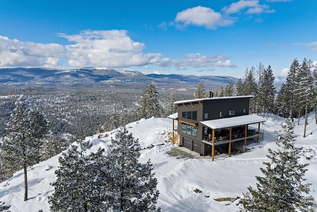 75 Meadows Dr, Whitefish, MT 59937 - snowy aerial view featuring a mountain view