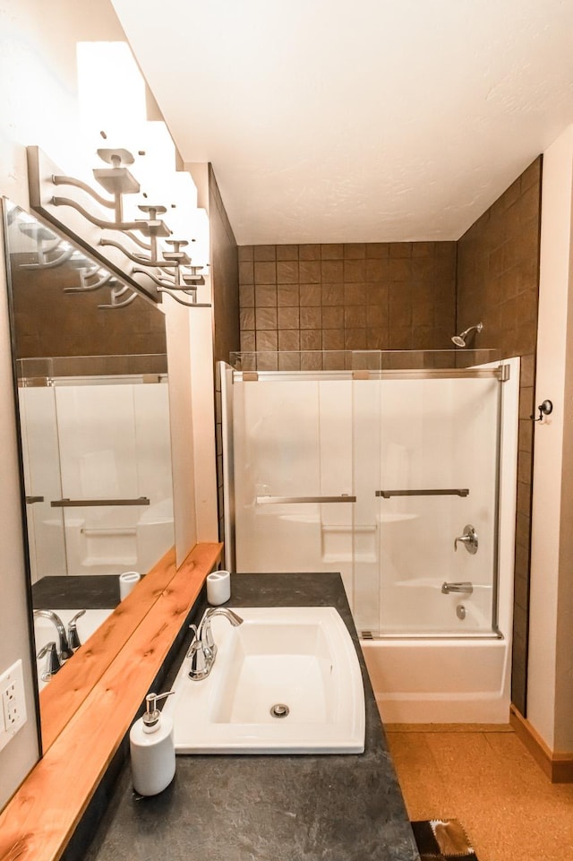 full bathroom with  shower combination and a sink